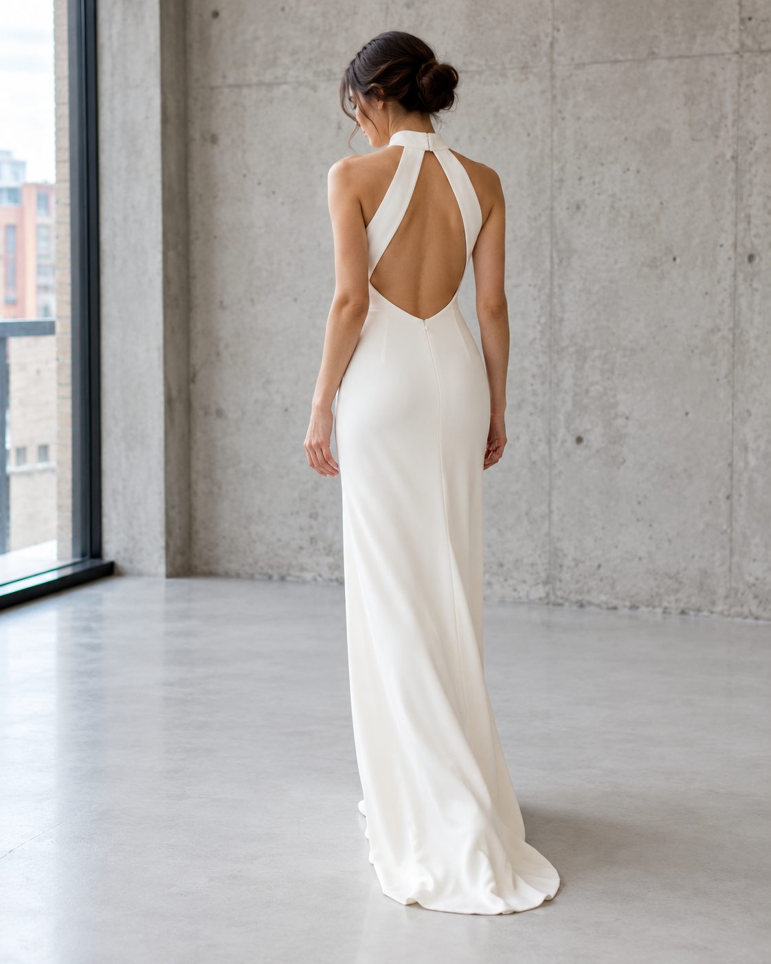 Minimal ivory crepe column wedding gown with an open back